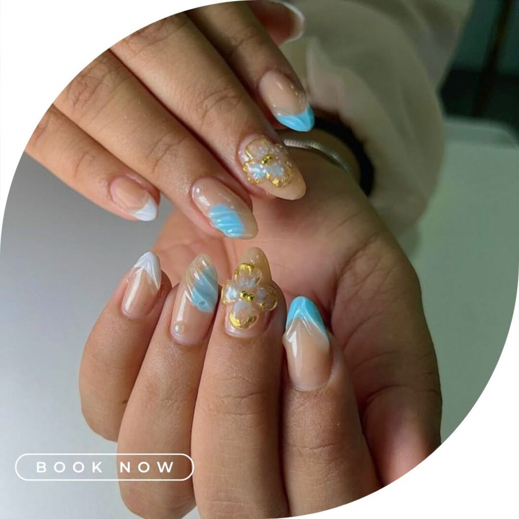 Aqua French tips with gold accents shared by MV Nails Mount Vernon